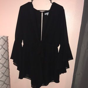Black romper with bell sleeves